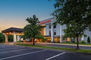 an empty parking lot in front of a hotel at Hampton Inn Binghamton/Johnson City in Binghamton