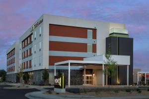 a rendering of the front of a hotel at Home2 Suites By Hilton Longmont in Longmont