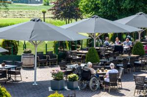 En restaurant eller et andet spisested på Van der Valk Hotel Goes