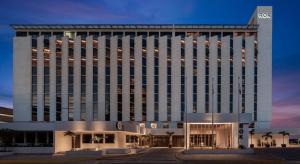 a rendering of the omni hotel at dusk at ROK Hotel Kingston Tapestry Collection By Hilton in Kingston