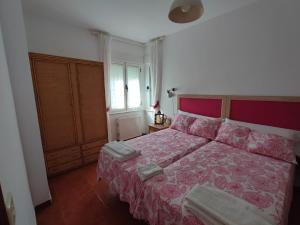 Ένα ή περισσότερα κρεβάτια σε δωμάτιο στο Casa Luz Mar