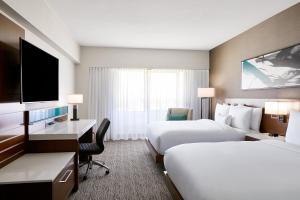 Ένα ή περισσότερα κρεβάτια σε δωμάτιο στο Delta Hotels by Marriott Phoenix Mesa