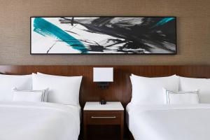 Ένα ή περισσότερα κρεβάτια σε δωμάτιο στο Delta Hotels by Marriott Phoenix Mesa