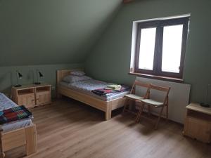 Postel nebo postele na pokoji v ubytování 4domki + 24 fotografií