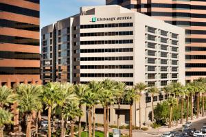 a building with the embassy suites logo on it at Embassy Suites by Hilton Phoenix Downtown North in Phoenix