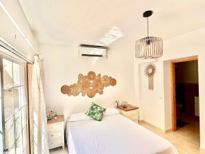 Postel nebo postele na pokoji v ubytování Villa Maria by Albir Proper Properties + 23 fotografií