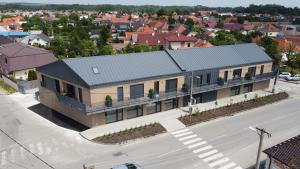 an overhead view of a building on a street at Project IK luxury apartments in Seredʼ