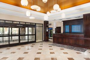 a lobby of a building with glass doors at Hilton Garden Inn Denver Tech Center in Denver