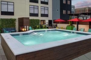 a swimming pool on top of a building at Home2 Suites By Hilton Nashville Downtown Convention Center in Nashville
