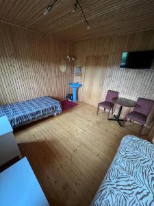 VeskisillaMSJ kodumajutus客房内的一张或多张床位