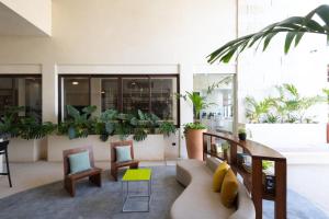 Posezení v ubytování Hotel Casa Barbara Holbox