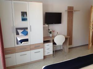 TV a/nebo společenská místnost v ubytování Villa Manja