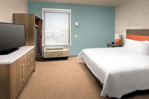 Home2 Suites By Hilton Las Cruces的电视和/或娱乐中心