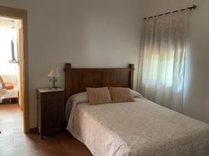Posteľ alebo postele v izbe v ubytovaní Apartamentos en sierra de gata ALMA