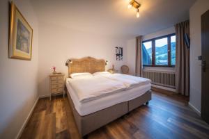Postel nebo postele na pokoji v ubytování Engel 16