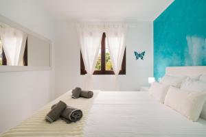 Postel nebo postele na pokoji v ubytování Lanzahost Casa Juan + 5 fotografií