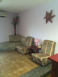 Posezení v ubytování Hostal L'Escaleta