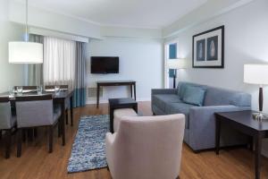 A seating area at Homewood Suites by Hilton Bonita Springs