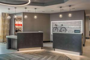 a lobby with a bike on the wall at Hampton Inn & Suites Tallahassee Capitol-University in Tallahassee