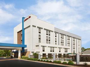 a rendering of the front of a hotel at Hampton Inn Charlotte/Matthews in Charlotte
