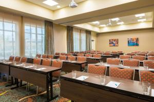 a conference room with tables and chairs in it at Homewood Suites by Hilton Little Rock Downtown in Little Rock