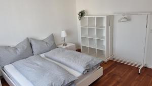 Postel nebo postele na pokoji v ubytování Apartment Heidi