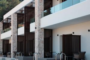 a view of the outside of a building with stairs at LANGO LUXURY LIVING s in Sivota