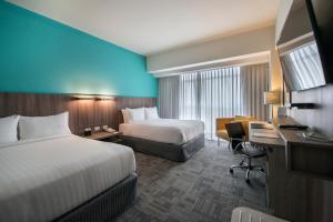 Postel nebo postele na pokoji v ubytování Holiday Inn - Lima Airport by IHG