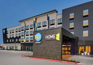 a building with a home sign in front of it at Tru By Hilton Euless Dfw West, Tx in Euless