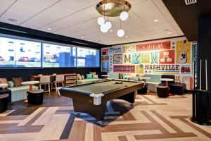 a billiard room with a pool table in a restaurant at Tru By Hilton Smyrna Nashville in Smyrna