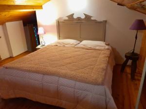 Postel nebo postele na pokoji v ubytování Chambre privée dans une maison typique gasconne