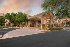 a rendering of the front of a hotel at Hilton Garden Inn Scottsdale North/Perimeter Center in Scottsdale