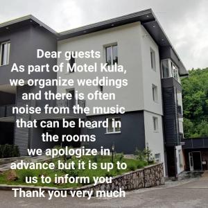 a building with the words dear guests as part of the model kiki we organize at Motel "KULA" in Cazin