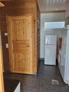 Kuchyň nebo kuchyňský kout v ubytování Villa Tumppu