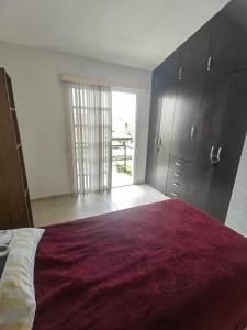 מיטה או מיטות בחדר ב-Agradable casa para descansar en Villas de Campo