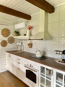 Fotografie z fotogalerie ubytování Rubikiai Lux Ežero Namelis v destinaci Aniūnai