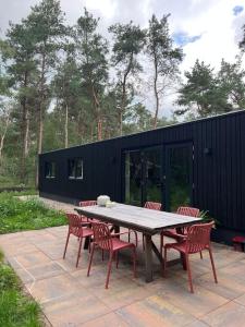Zahrada ubytování Heerlijk familiehuis in het bos