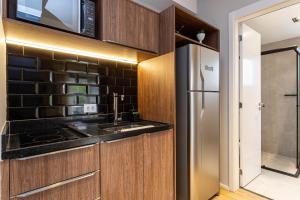 A cozinha ou cozinha compacta de Charlie Hotel Atmosfera Paulista