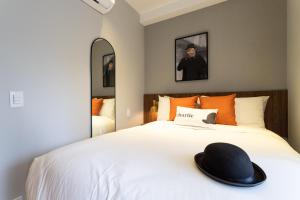 Cama ou camas em um quarto em Charlie Hotel Atmosfera Paulista