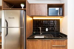 A cozinha ou cozinha compacta de Charlie Hotel Atmosfera Paulista