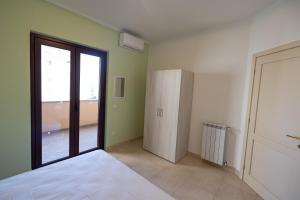 Postel nebo postele na pokoji v ubytování Chiaro di Luna Guest House