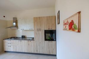 Kuchyň nebo kuchyňský kout v ubytování Chiaro di Luna Guest House