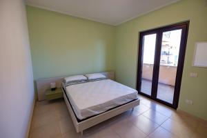 Postel nebo postele na pokoji v ubytování Chiaro di Luna Guest House