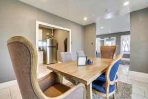 a dining room with a wooden table and chairs at Atlantic City Getaway Near Casinos and Boardwalk! in Atlantic City