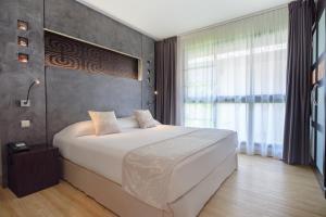 Te Moana Tahiti Resort房間的床