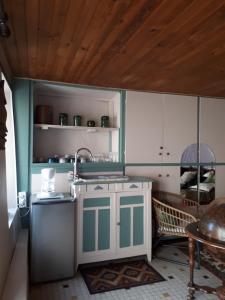 a kitchen with a sink and a counter top at la maison de Juliette En bas in Lascabanes