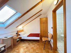 Postel nebo postele na pokoji v ubytování Apartman Miramare