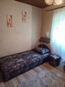 Posteľ alebo postele v izbe v ubytovaní Holiday home Balatonkeresztur 12