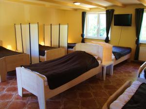 TV a/nebo společenská místnost v ubytování Apart Hotel Sarstedter Hof