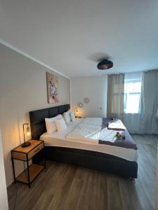 Ein Bett oder Betten in einem Zimmer der Unterkunft Hotel Restaurant Zum Landmann
